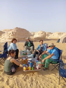 4x4 Jeep tour navigating the golden sand dunes of the Great Sand Sea in Egypt's Western Desert.